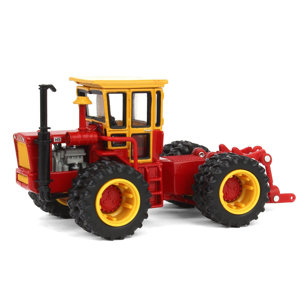Vintage Versatile toy tractor, on a white background