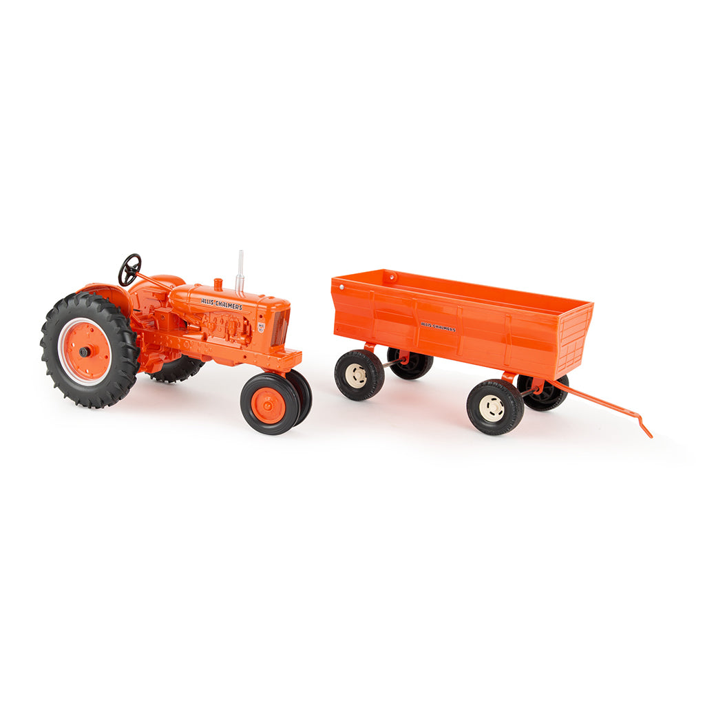 Orange Allis-Chalmers toy tractor with a flarebox wagon on a white background