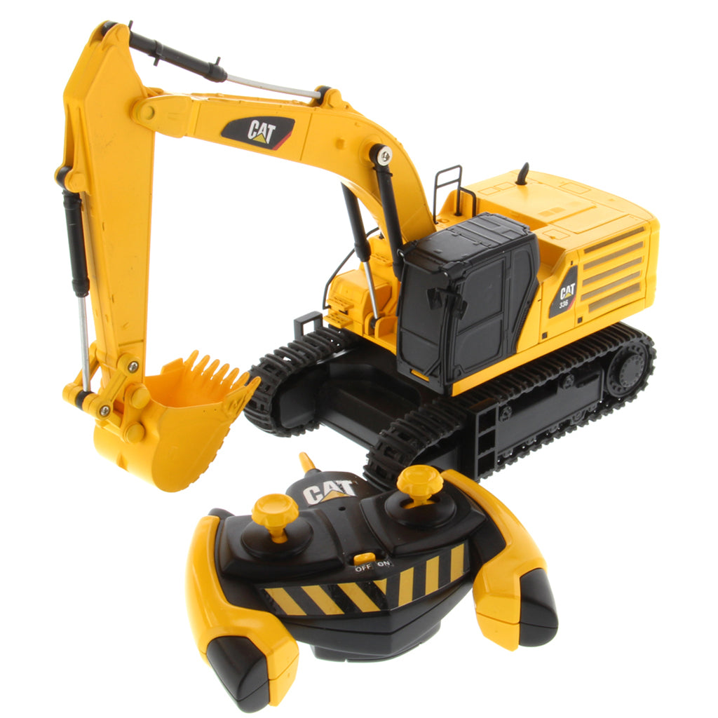 A yellow and black CAT toy remote control excavator with a bucket attachment, photographed on a clean white background.