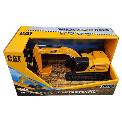 CAT 328 Hydraulic Excavator RC construction toy in its original yellow and blue retail packaging, shown on a white background.