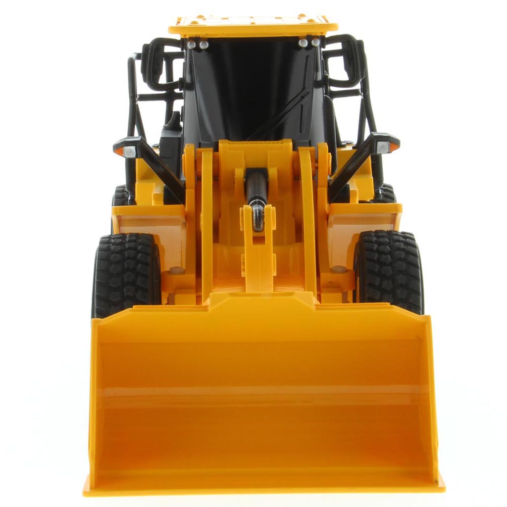 A yellow and black radio controlled wheel loader with a front bucket loader, photographed on a clean white background. The brand name CAT is visible on the side of the cab.