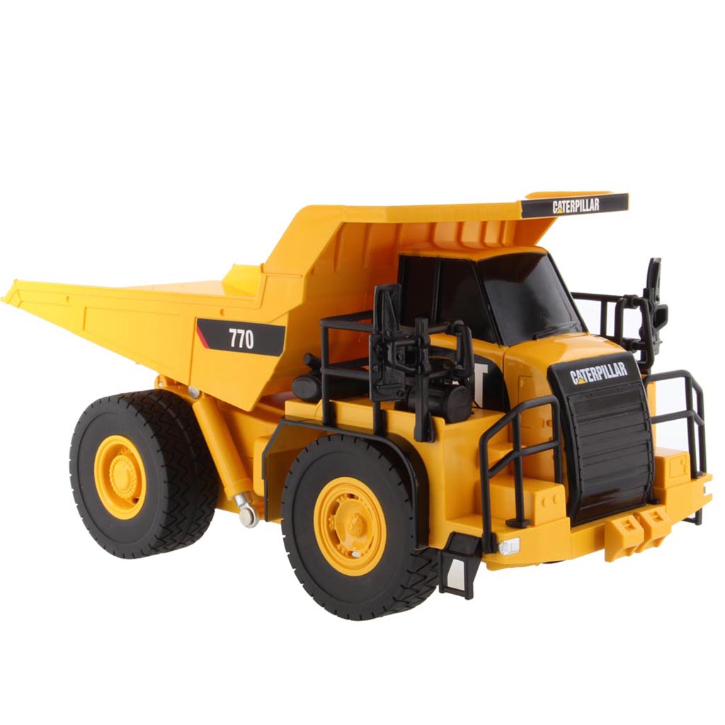 Toy Remote Controlled Yellow and Black Caterpillar 770 Dump Truck on a White Background