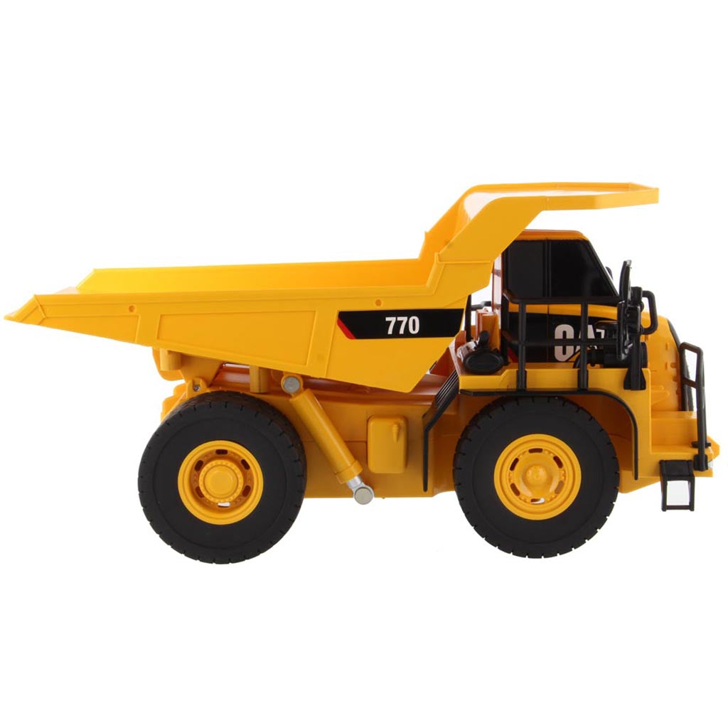 Toy Remote Controlled Yellow and Black Caterpillar 770 Dump Truck on a White Background