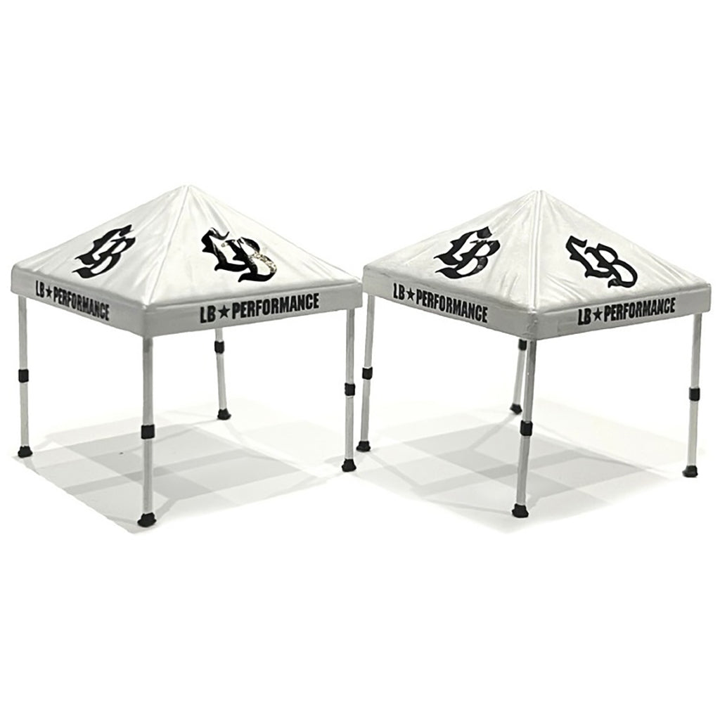 Two white tents with 'LB Performance' branding on a white background
