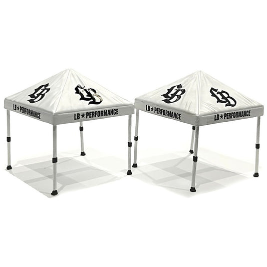 Two white tents with 'LB Performance' branding on a white background