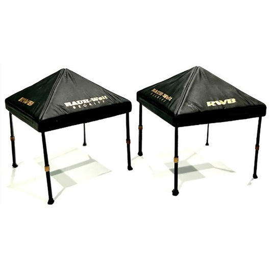 Two black pyramid-shaped tents with 'RWB' branding on a white background