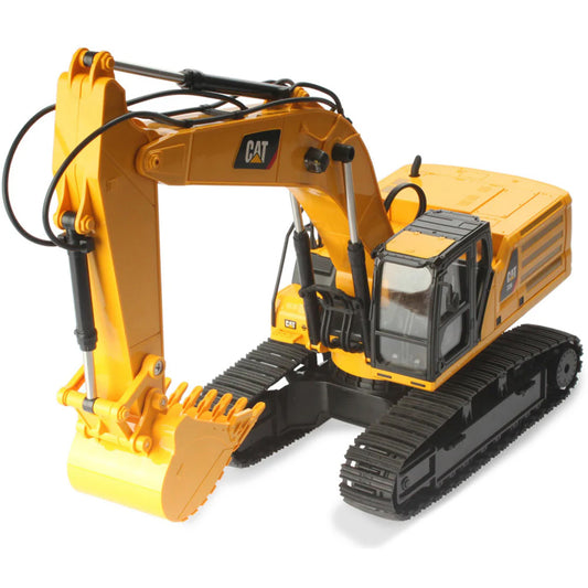 Model of a Radio Controlled Yellow Caterpillar 336 Excavator on a White Background