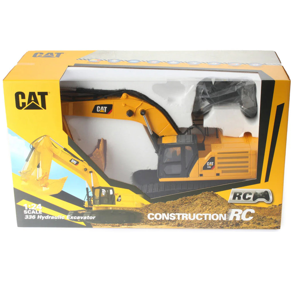 Boxed toy excavator with CAT branding on a white background
