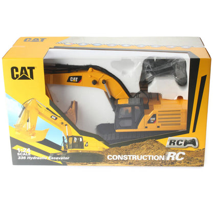 Boxed toy excavator with CAT branding on a white background