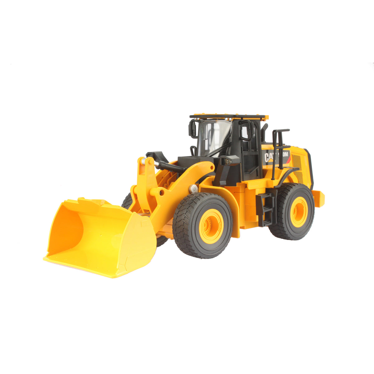 Radio controlled model of a CAT yellow & black Caterpillar 950M wheel loader on a white background