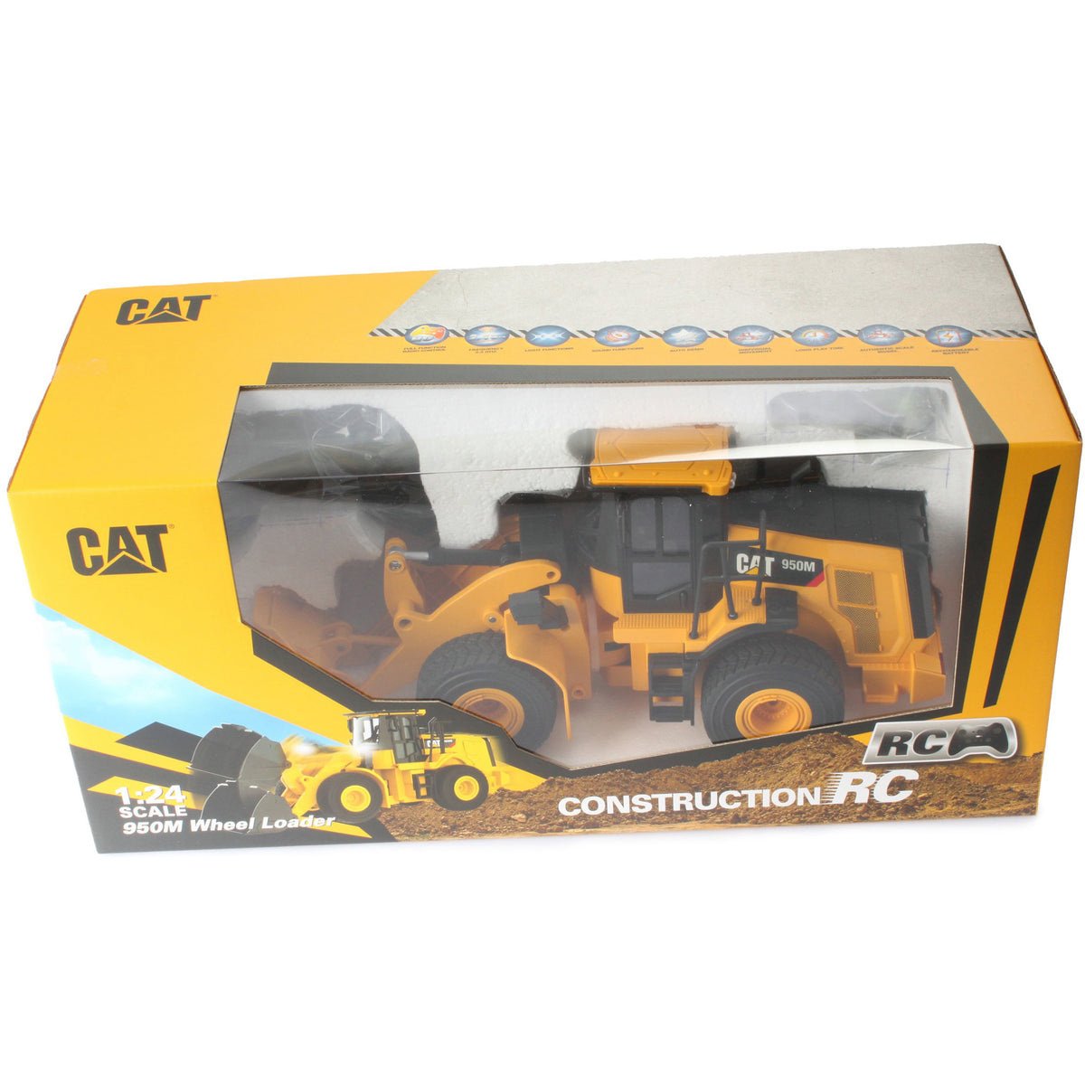 CAT brand construction RC wheel loader toy in its original yellow and gray retail packaging, showing the yellow die-cast model vehicle through a clear plastic window.