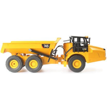 Remote Controlled Model of a CAT Yellow and Black Caterpillar 745 Articulated Dump Truck on a White Background