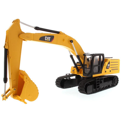 Yellow and Black Remote Controlled Toy Caterpillar 336 Excavator on a White Background