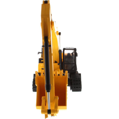 Yellow and Black Remote Controlled Toy Caterpillar 336 Excavator on a White Background
