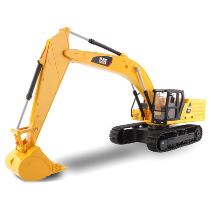 Yellow and Black Remote Controlled Toy Caterpillar 336 Excavator on a White Background