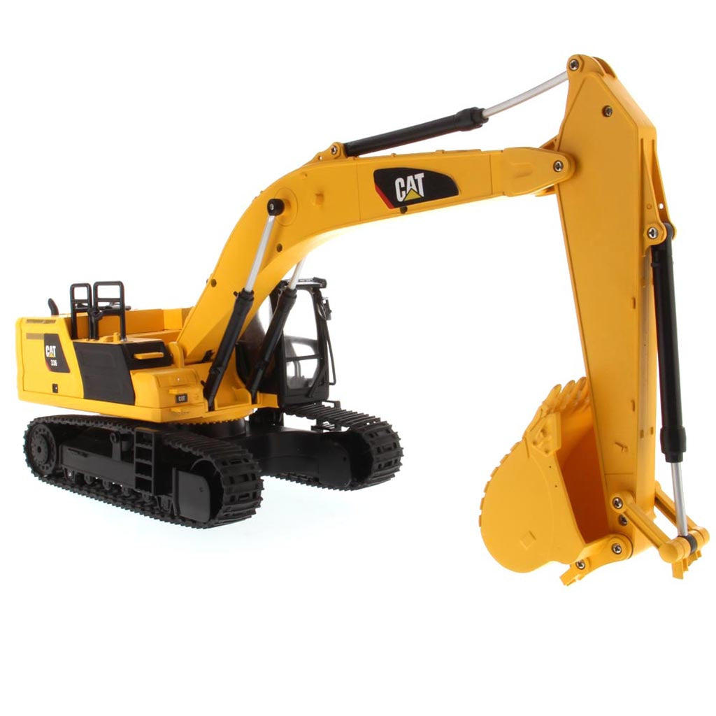 Yellow and Black Remote Controlled Toy Caterpillar 336 Excavator on a White Background