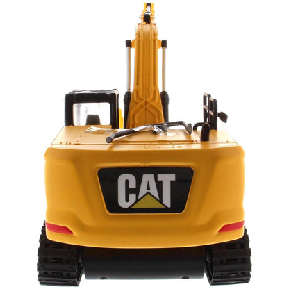 Yellow and Black Remote Controlled Toy Caterpillar 336 Excavator on a White Background