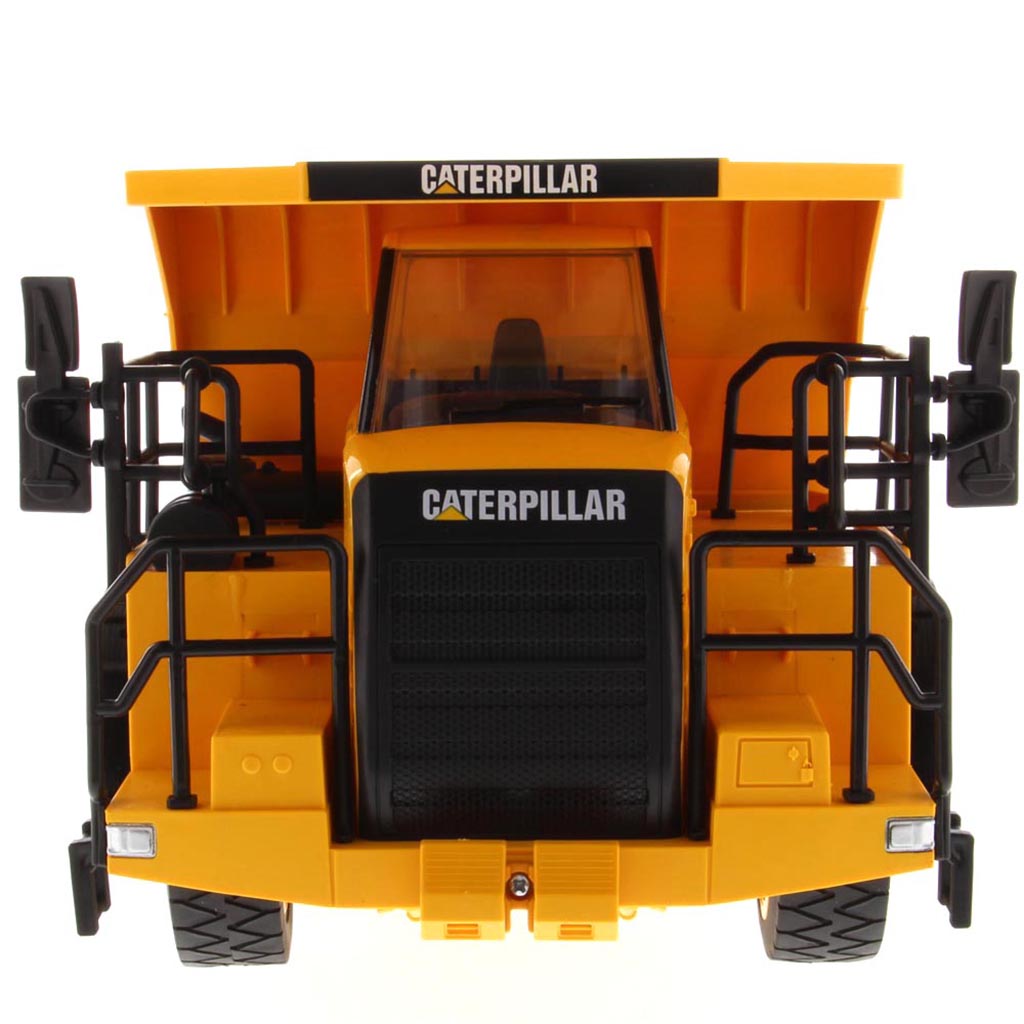 Yellow and Black Remote Controlled Model of a Caterpillar 770 Mining Dump Truck on a White Background