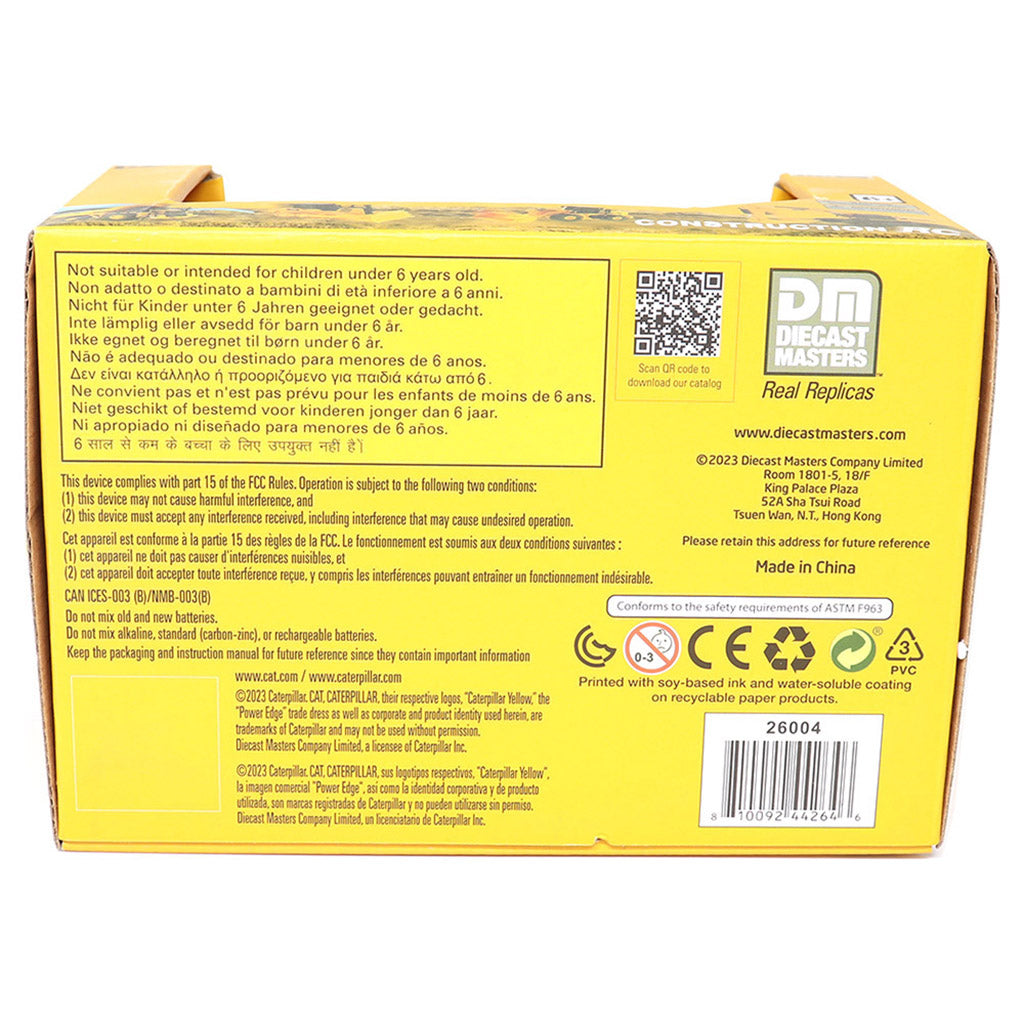 The back of a yellow box of Diecast Masters Radio Controlled Dump Truck, showing detailed safety instructions, a QR code, and the Diecast Masters logo on a white background.