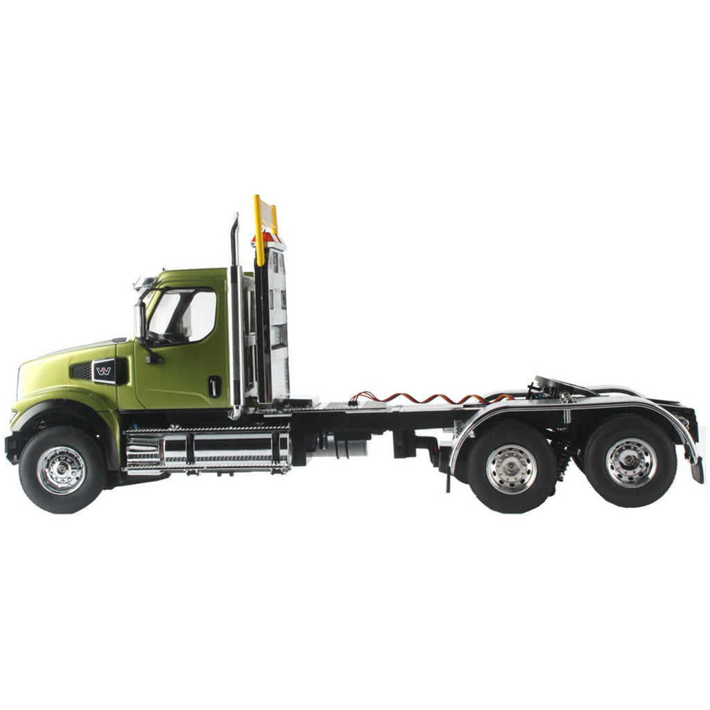 1:16 Scale Model of a Remote Controlled Western Star 49X Day Cab Tractor in Green on a White Background