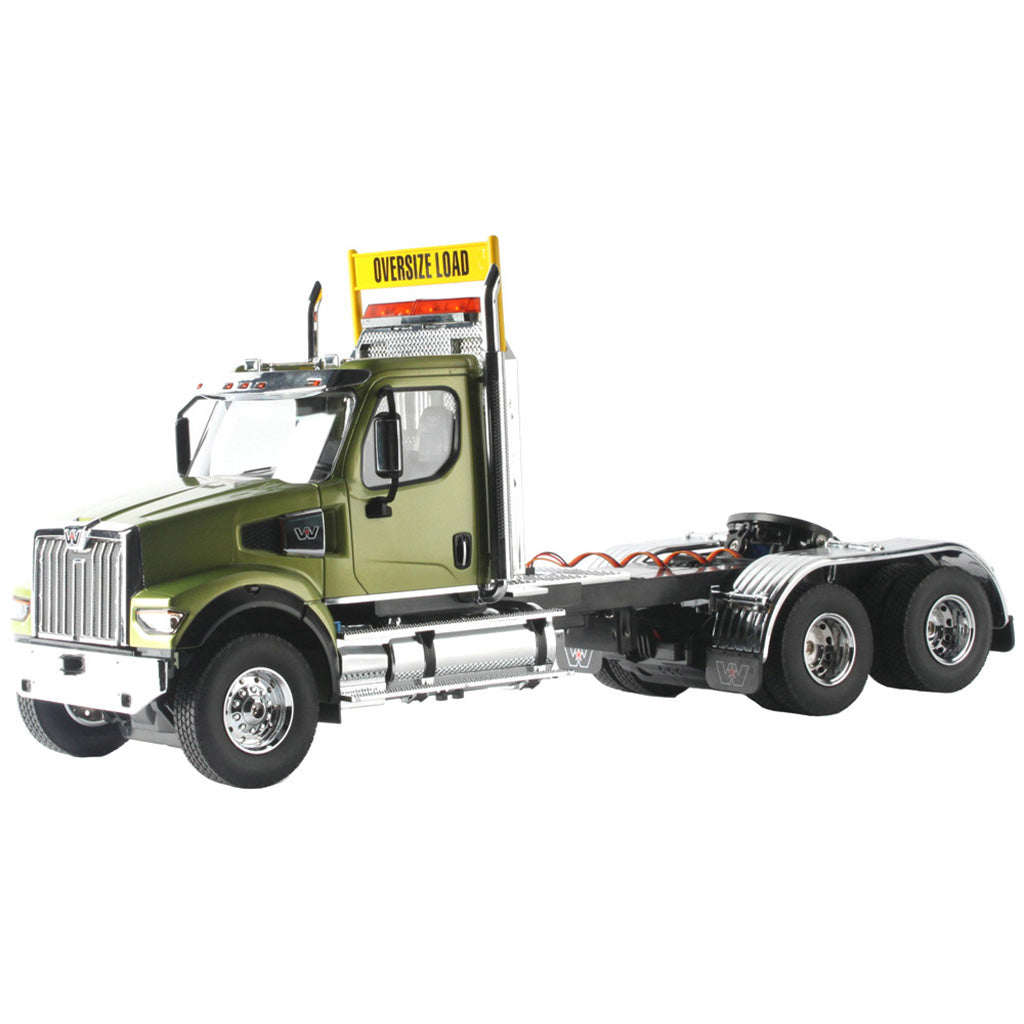 1:16 Scale Model of a Remote Controlled Western Star 49X Day Cab Tractor in Green on a White Background