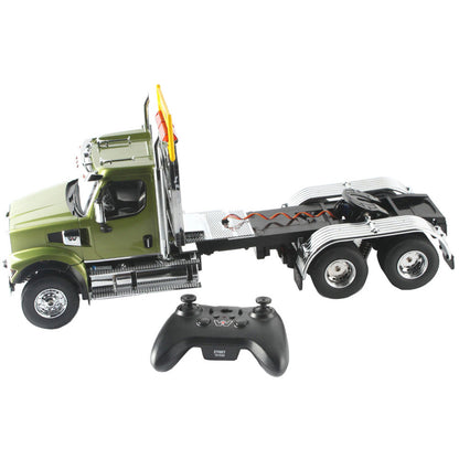 1:16 Scale Model of a Remote Controlled Western Star 49X Day Cab Tractor in Green on a White Background