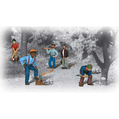 Model figures of lumberjacks in a forest setting with trees and ground.