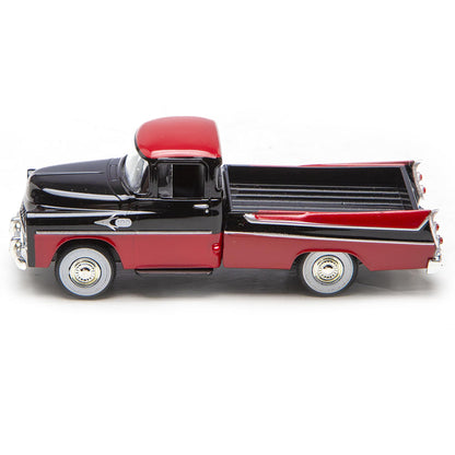 Model of a red and black pickup truck on a white background