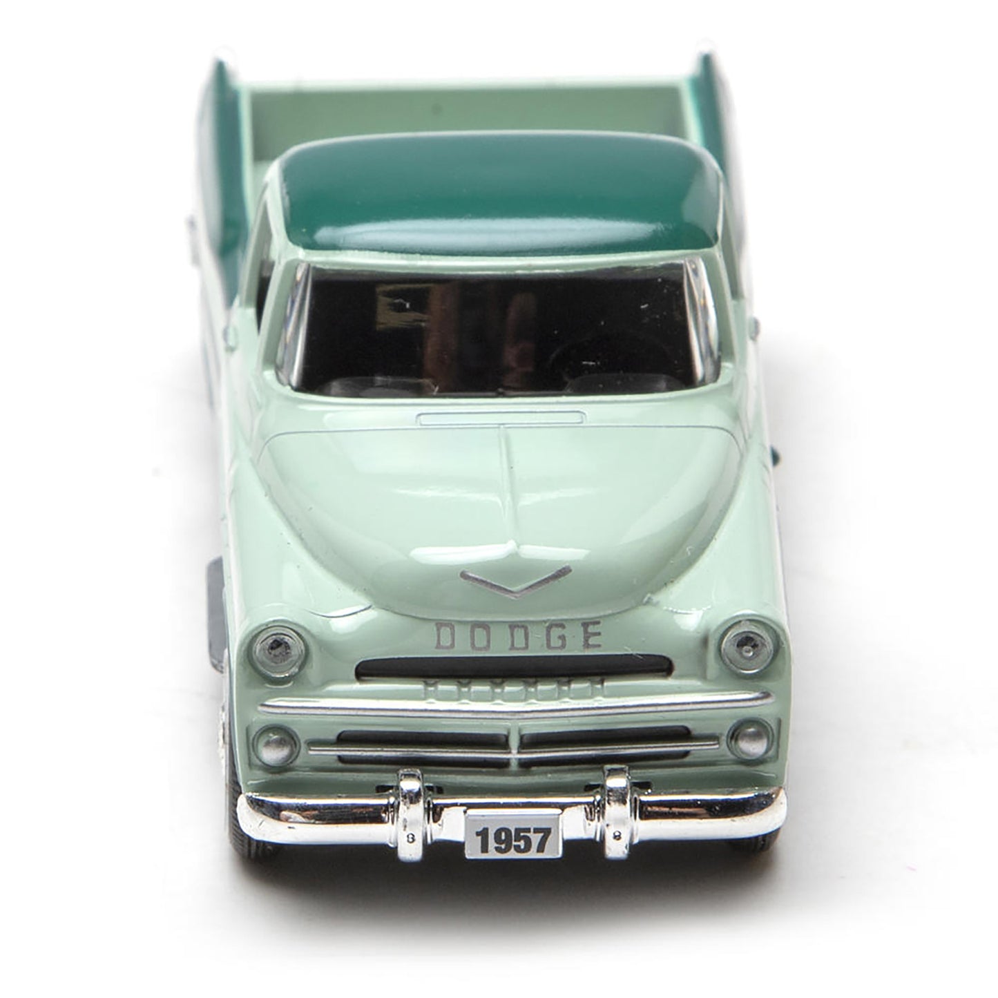 Model of a 1957 Dodge truck on a white background
