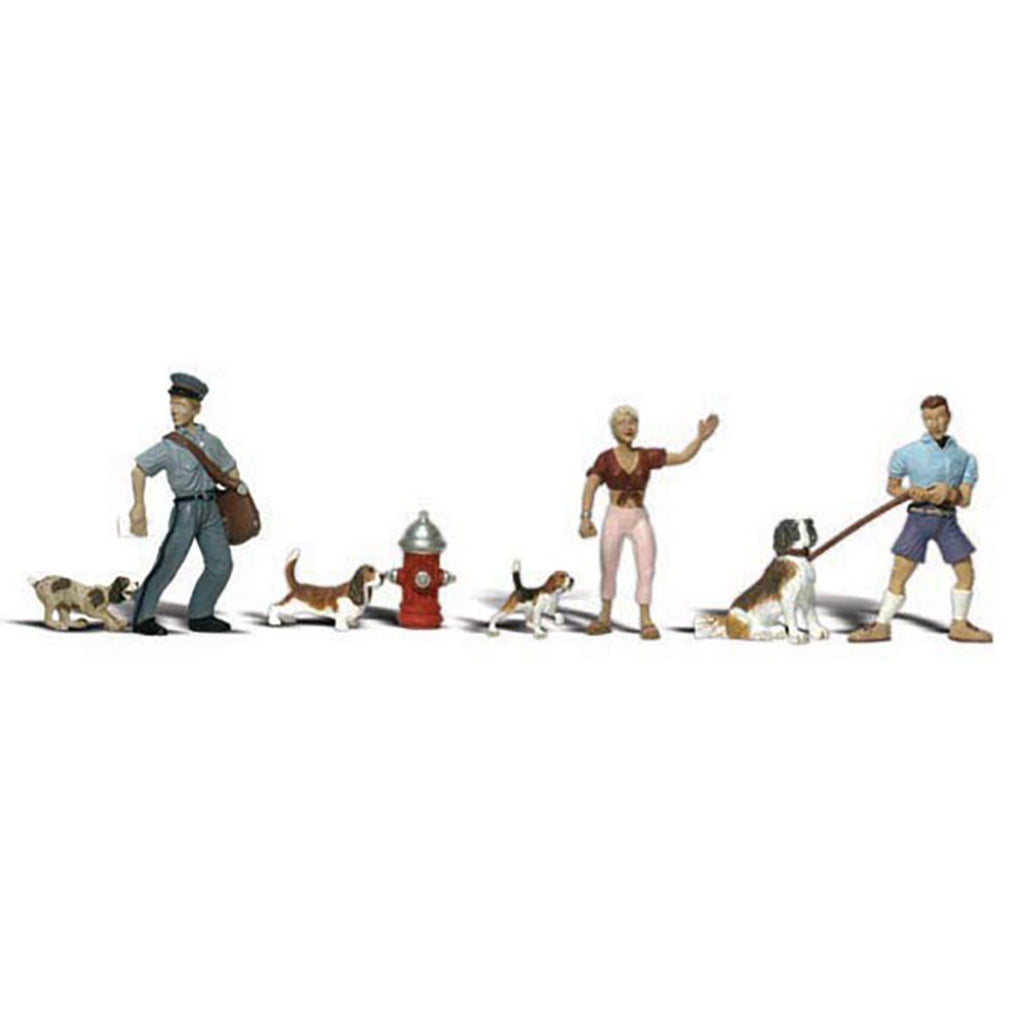 A set of miniature figurines depicting people with dogs, including a postman, a woman waving, and a man walking a dog, alongside small dog figures and a red fire hydrant, isolated on a white background.