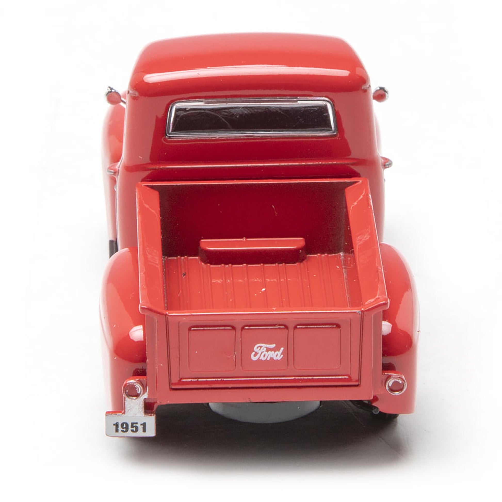 Red model truck with 'Ford' logo on a white background