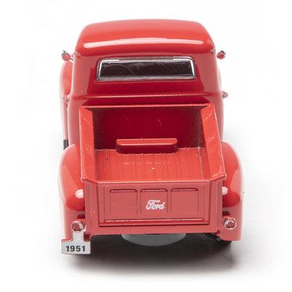 Red model truck with 'Ford' logo on a white background