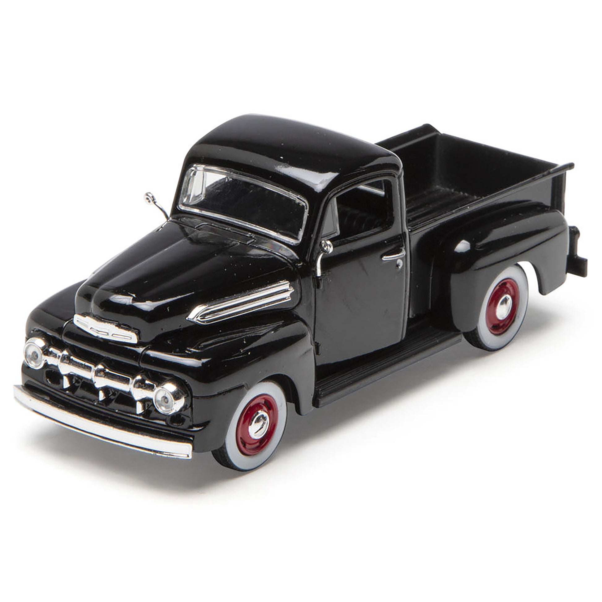 Model of a black vintage truck on a white background