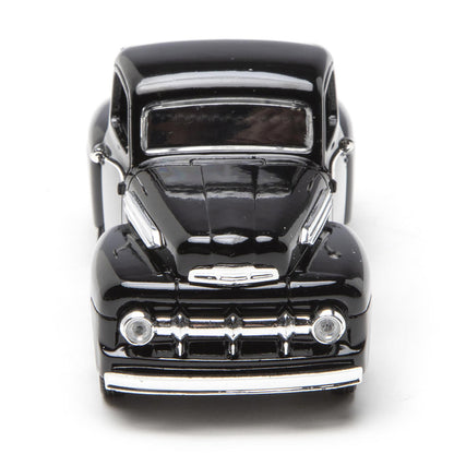 Black model car on a white background