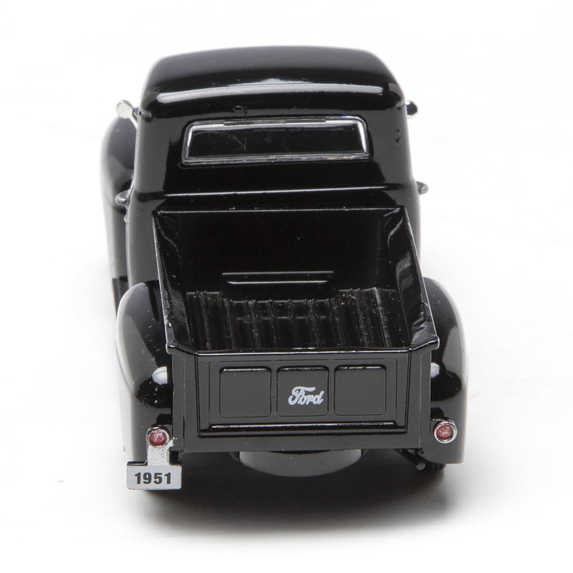 Model of a vintage Ford truck on a white background