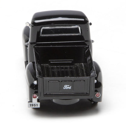 Model of a vintage Ford truck on a white background