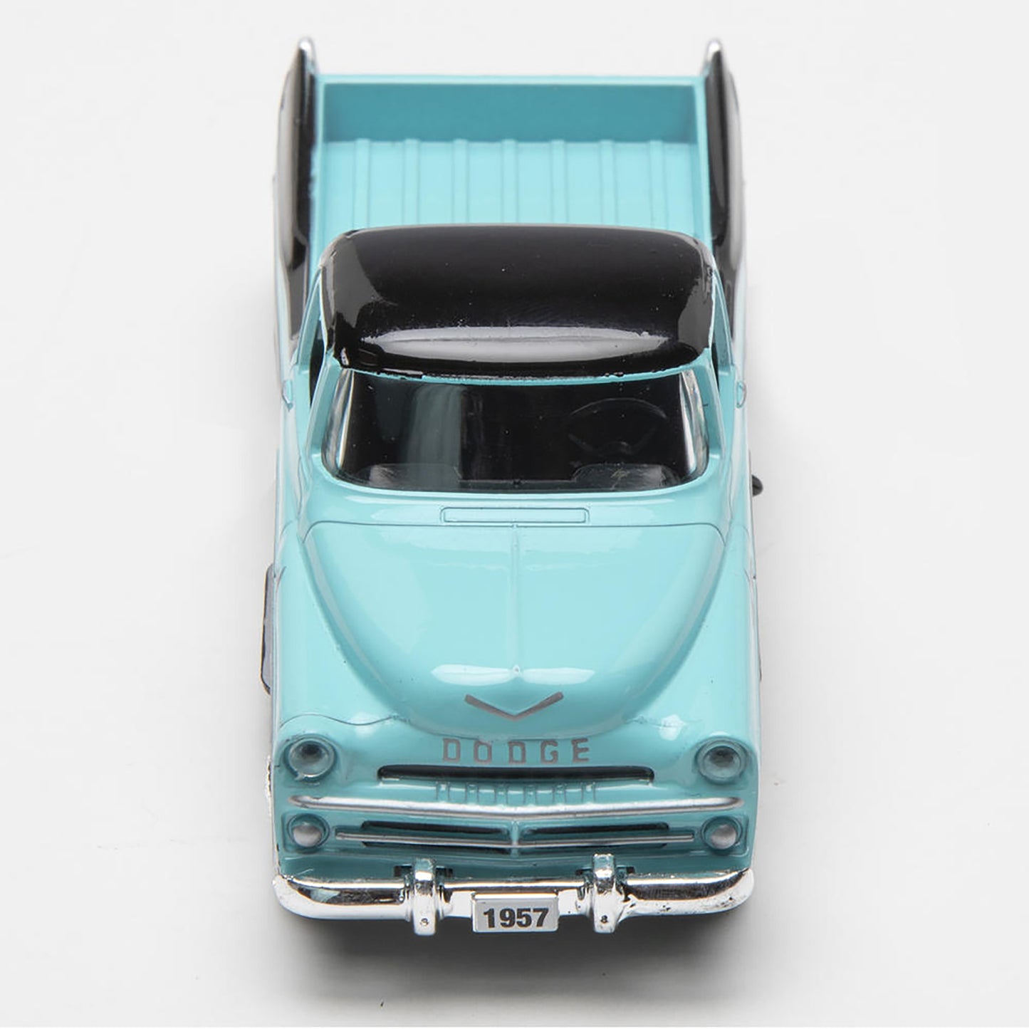 Model of a 1957 Dodge truck on a white background