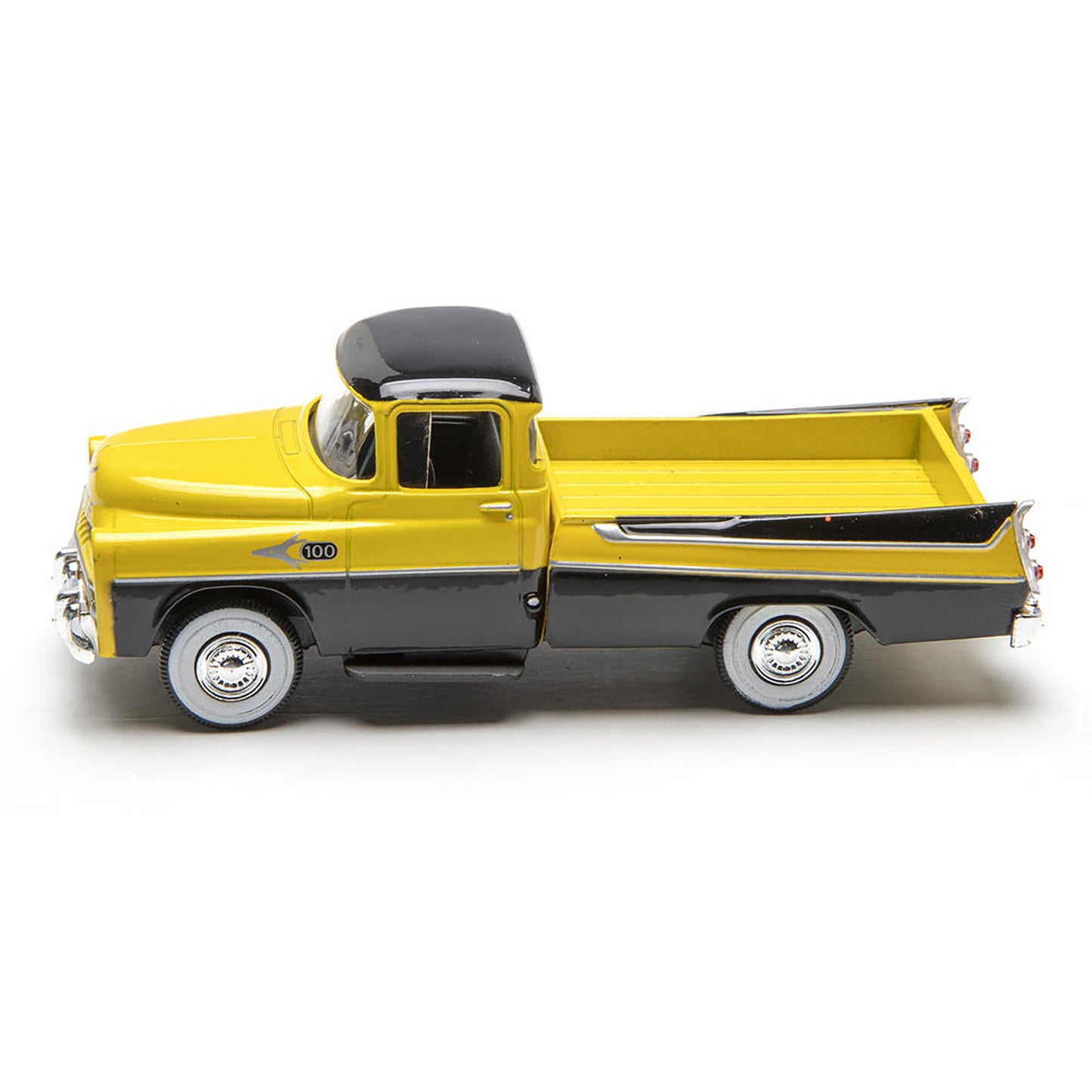 Model of a yellow and gray pickup truck on a white background