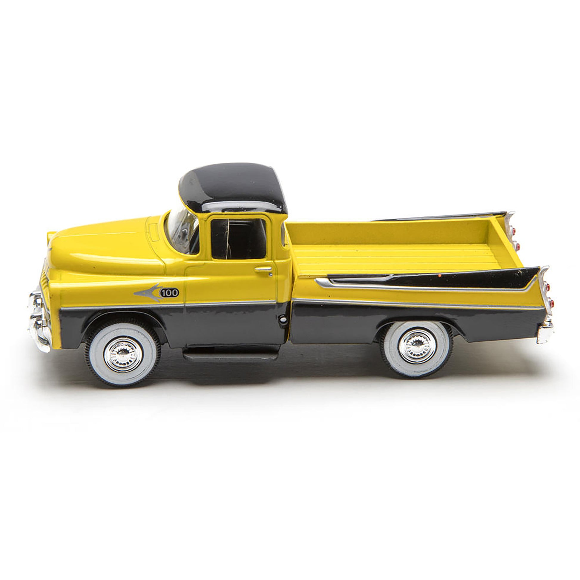 Model of a yellow and gray pickup truck on a white background