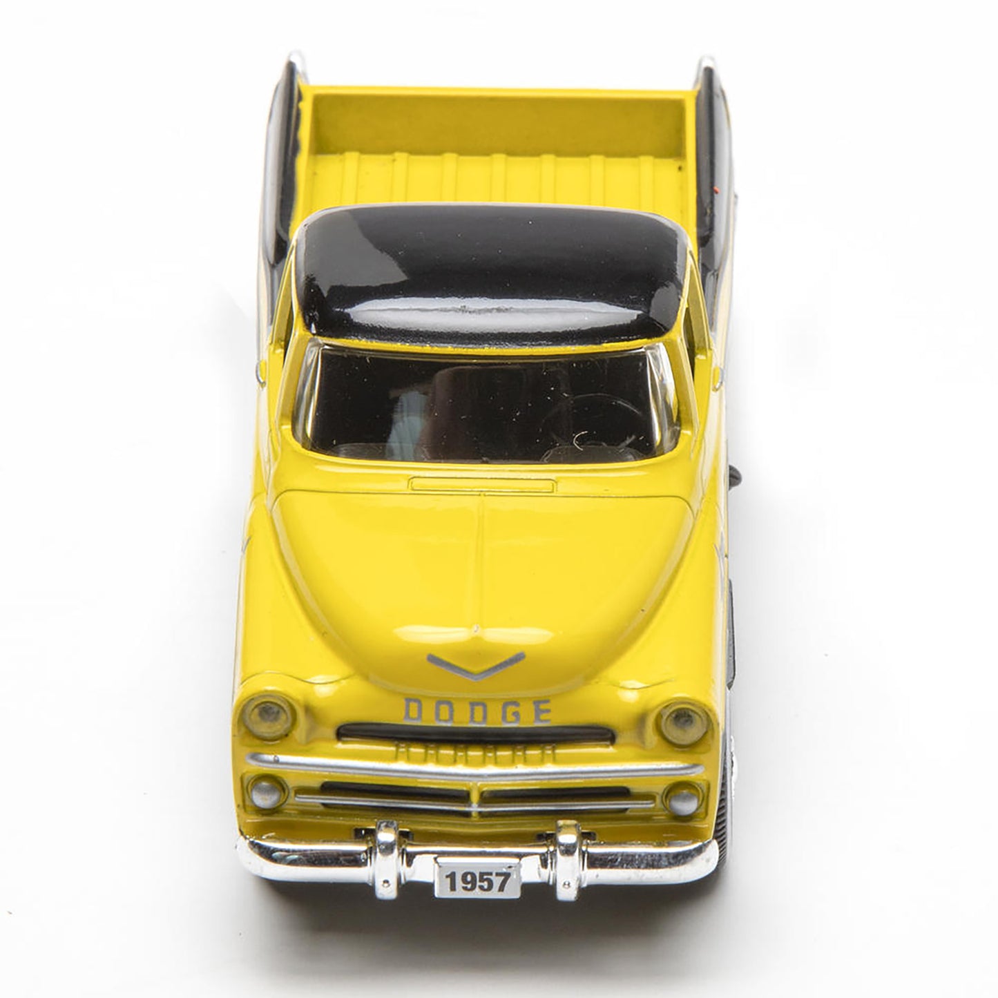 Yellow model truck with black roof on a white background