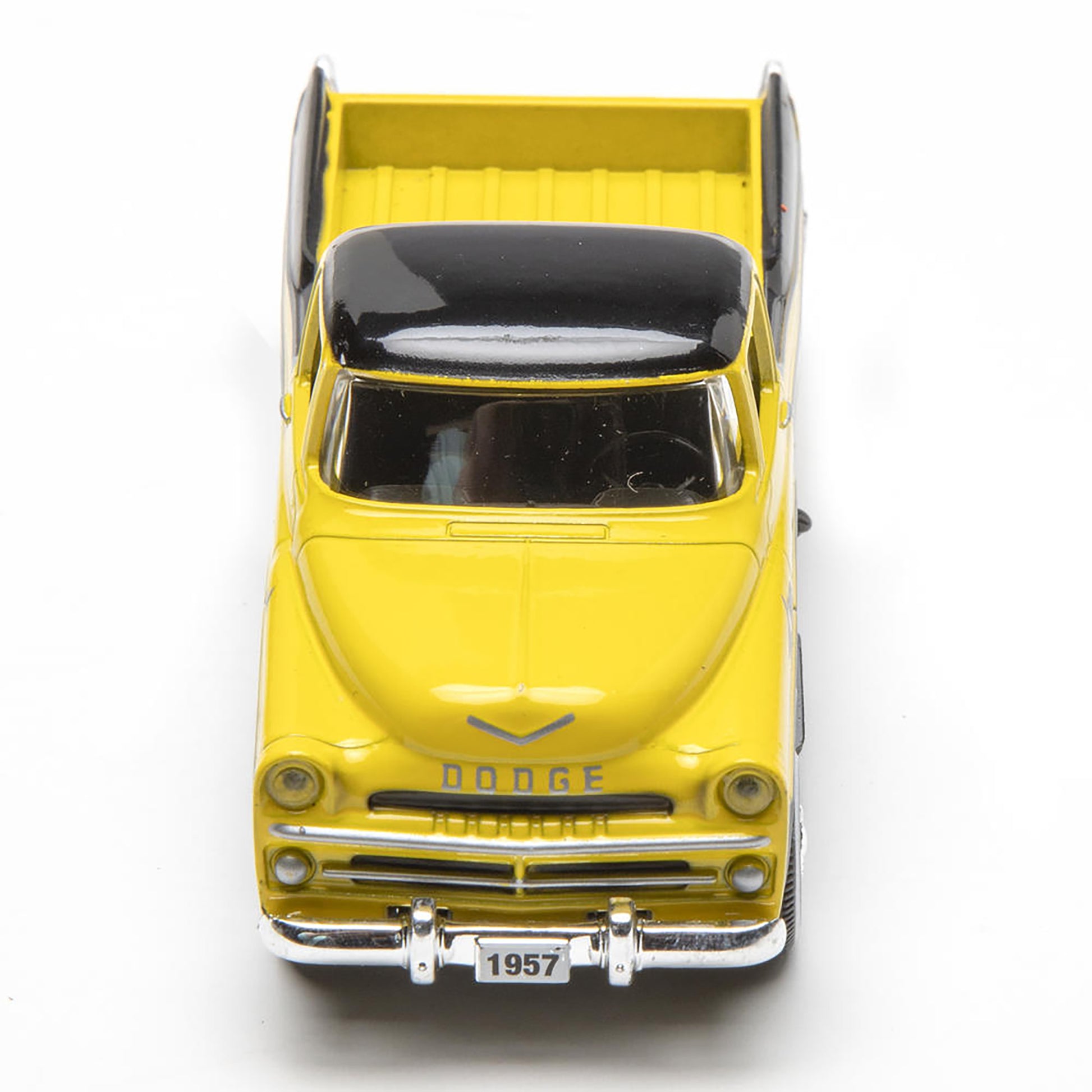 Yellow model truck with black roof on a white background
