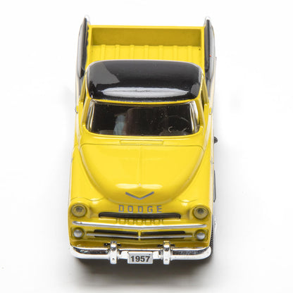 Yellow model truck with black roof on a white background