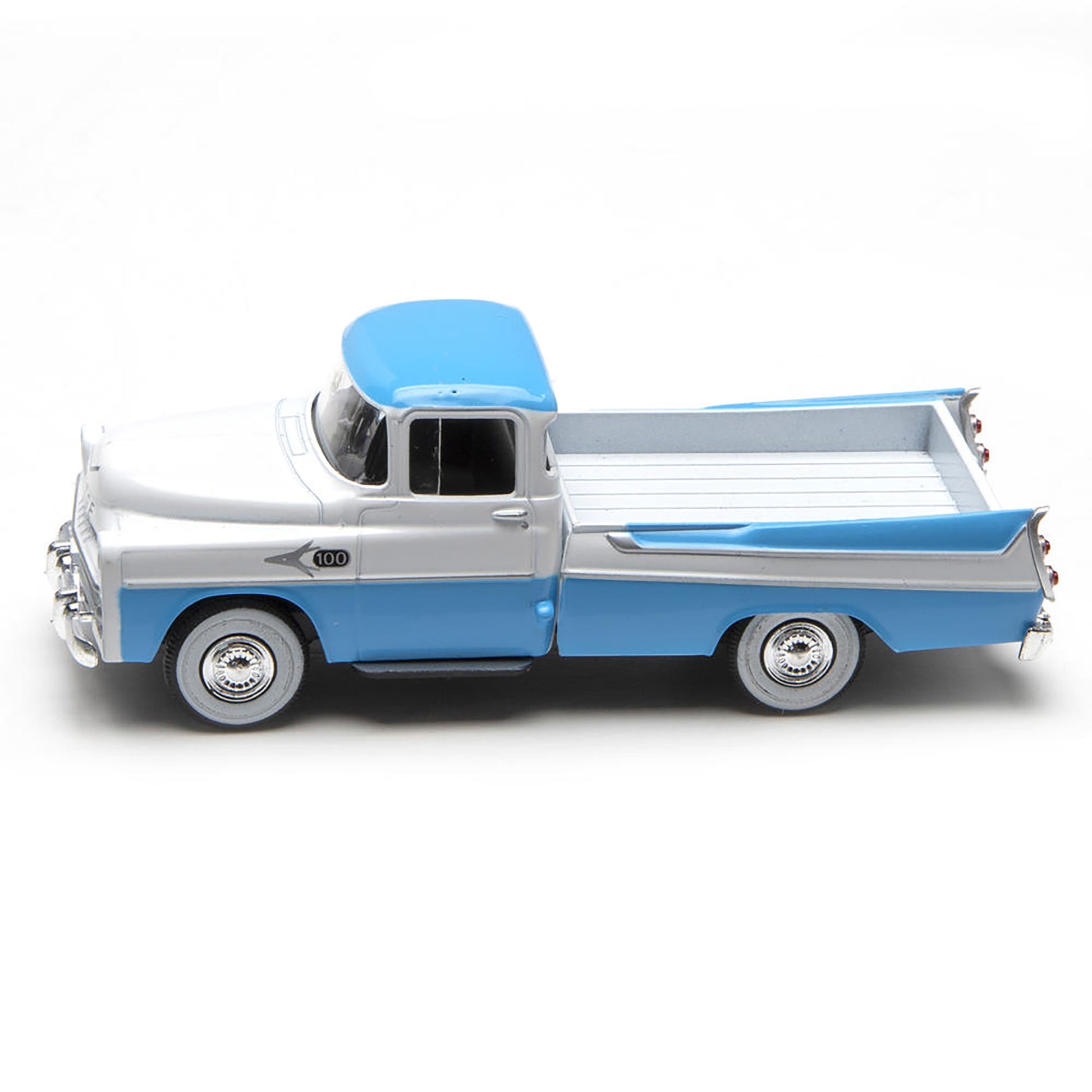 Model of a blue and silver vintage truck on a white background