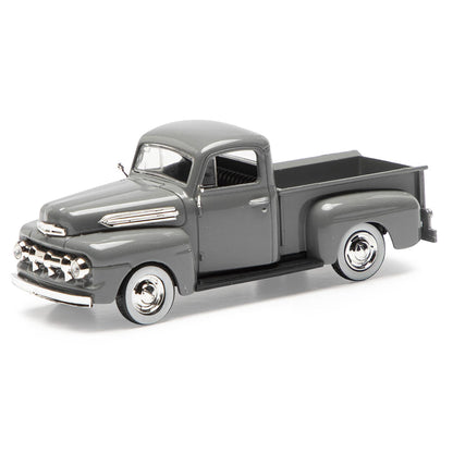Model of a vintage gray pickup truck on a white background