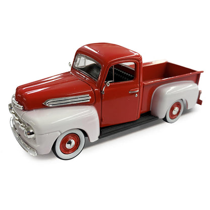 Model of a red and white vintage truck on a white background