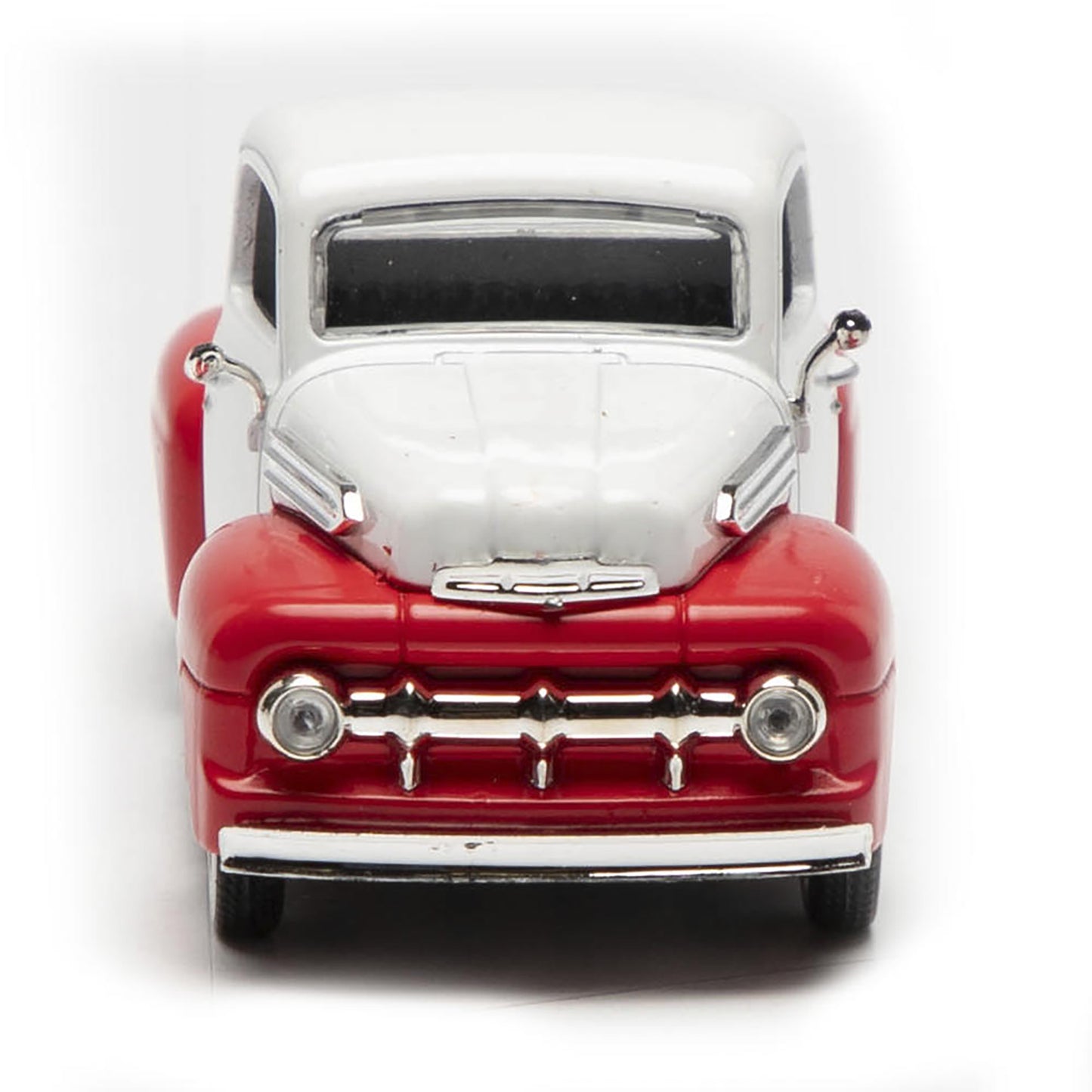 Model of a red and white vintage truck on a white background