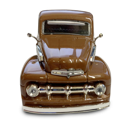 Model of a vintage brown truck on a white background