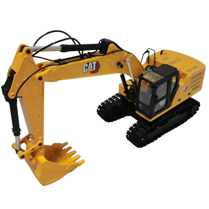 A yellow and black Remote Controlled CAT excavator toy shown on a plain white background, with the CAT logo visible on the arm.
