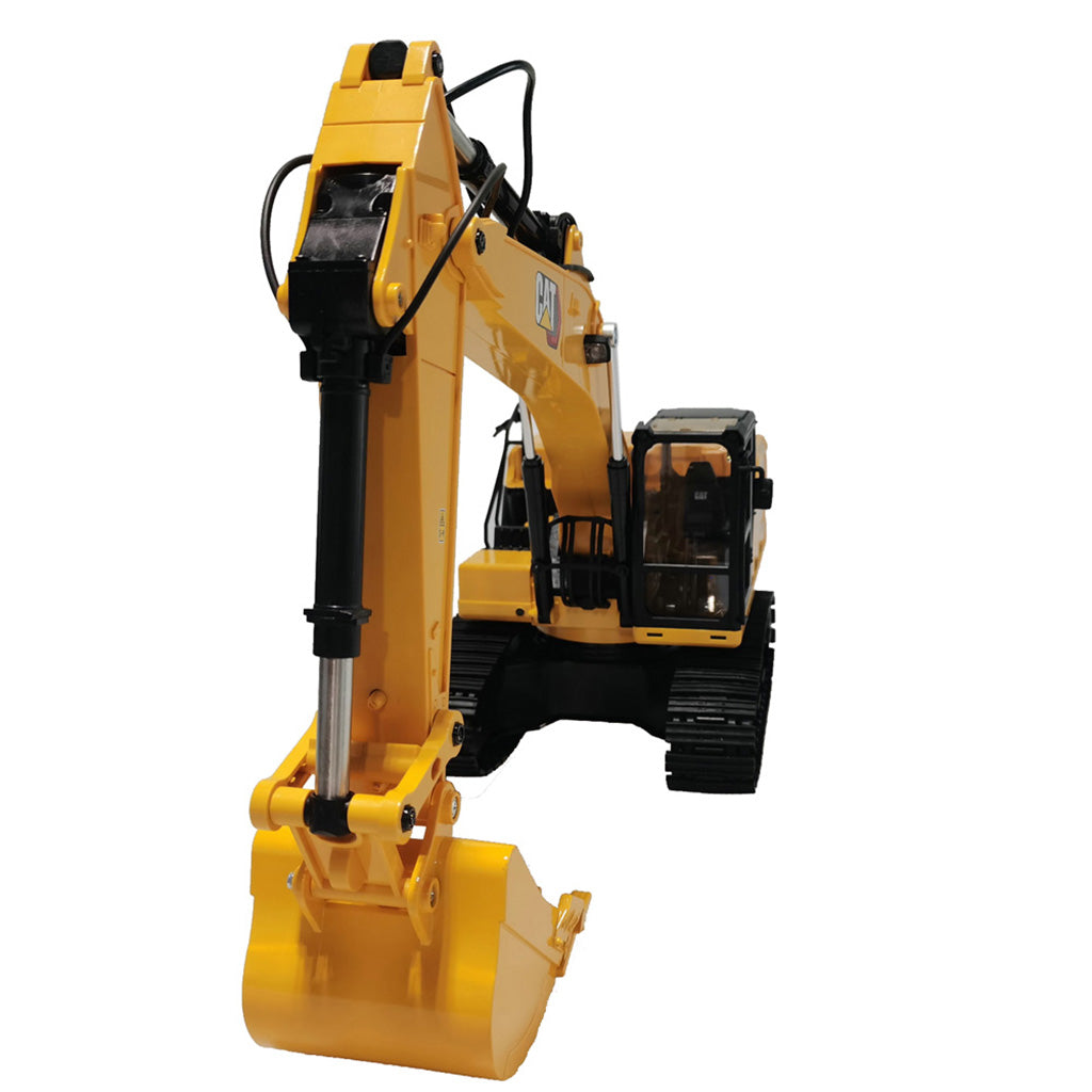 A yellow and black Remote Controlled CAT excavator toy shown on a plain white background, with the CAT logo visible on the arm.