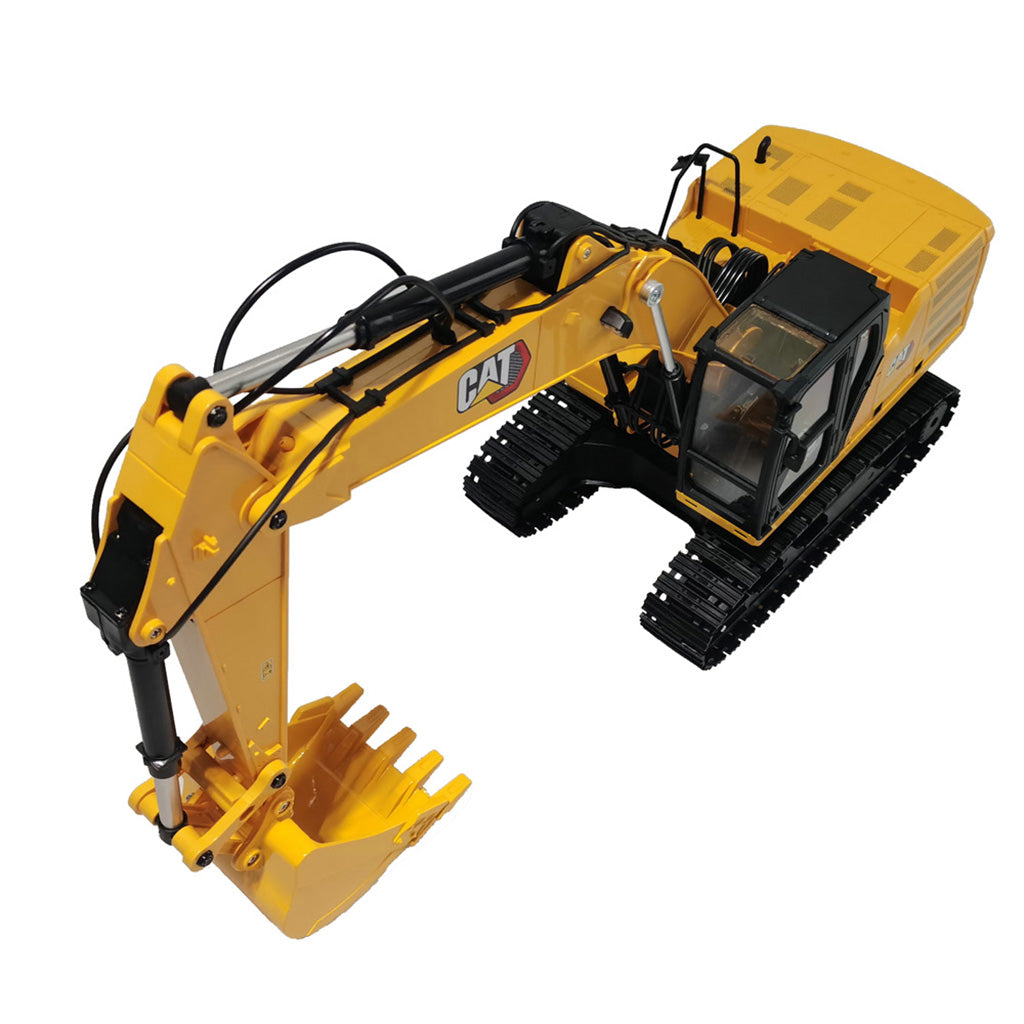 A yellow and black Remote Controlled CAT excavator toy shown on a plain white background, with the CAT logo visible on the arm.